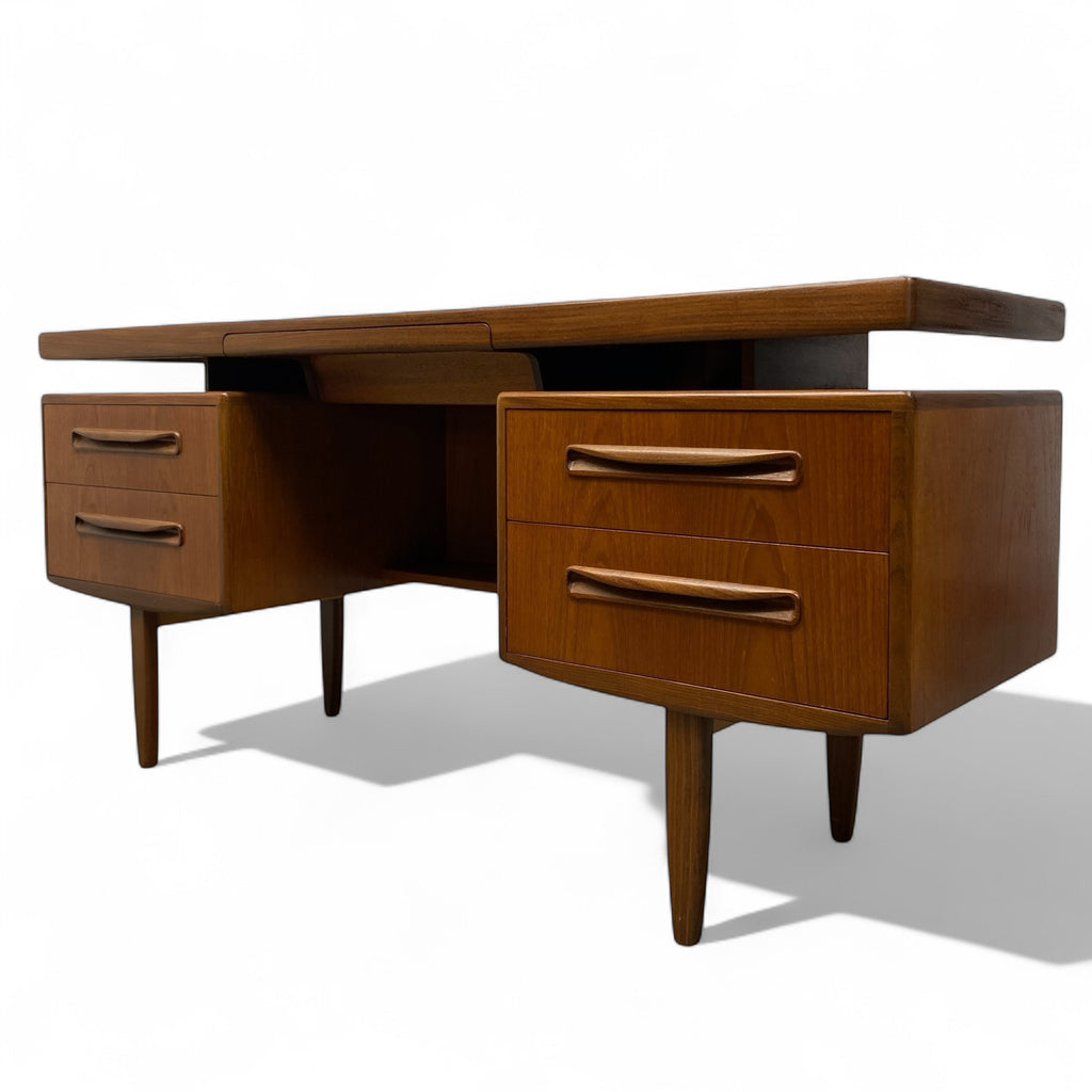 Wooden desk with multiple drawers on a white background