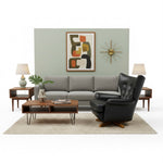 Load image into Gallery viewer, Modern living room with gray sofa, black armchair, and wooden coffee table.
