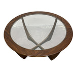 Load image into Gallery viewer, Round wooden coffee table with glass top on a white background
