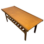 Load image into Gallery viewer, Wooden coffee table with a white background
