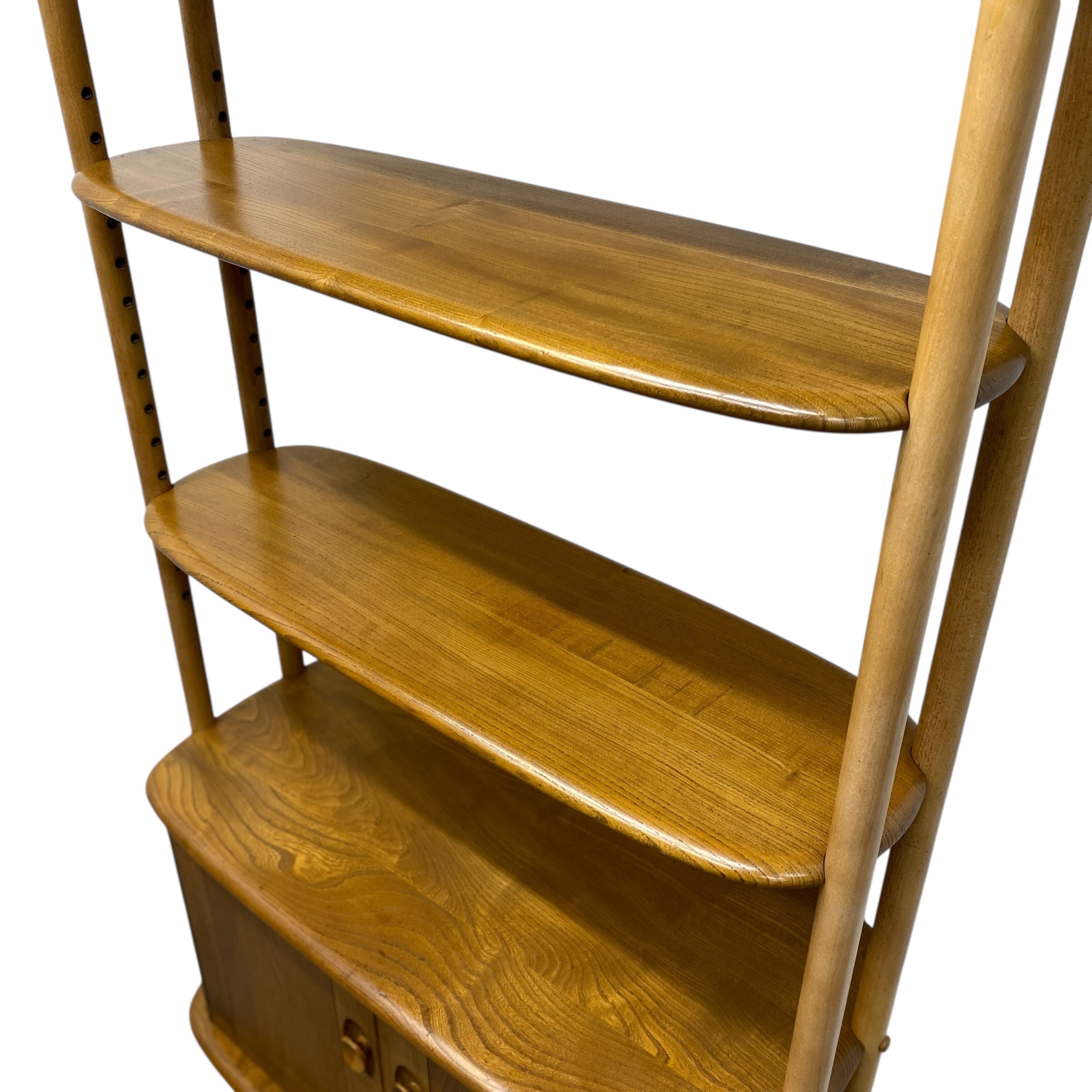 Wooden ladder shelf with four shelves on a white background
