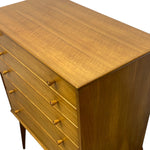 Load image into Gallery viewer, Wooden dresser with four drawers on a white background
