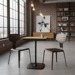 Load image into Gallery viewer, Modern cafe interior with two chairs and a table near large windows.
