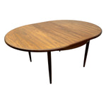 Load image into Gallery viewer, Wooden oval table with four legs on a white background
