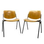 Load image into Gallery viewer, Two wooden chairs with metal frames on a white background
