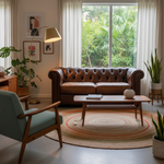 Load image into Gallery viewer, Living room with brown leather sofa, green armchair, and coffee table with plants and decor.
