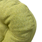 Load image into Gallery viewer, Close-up of a textured, tufted cushion in a heathered olive green color, showing the soft fabric detail against a plain white background.
