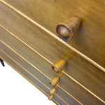 Load image into Gallery viewer, Close-up of a wooden surface with acorn-shaped decorations.
