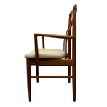 Load image into Gallery viewer, Wooden chair with a cushioned seat on a white background
