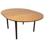 Load image into Gallery viewer, OVAL DINING TABLE ON A WHITE BACKGROUND
