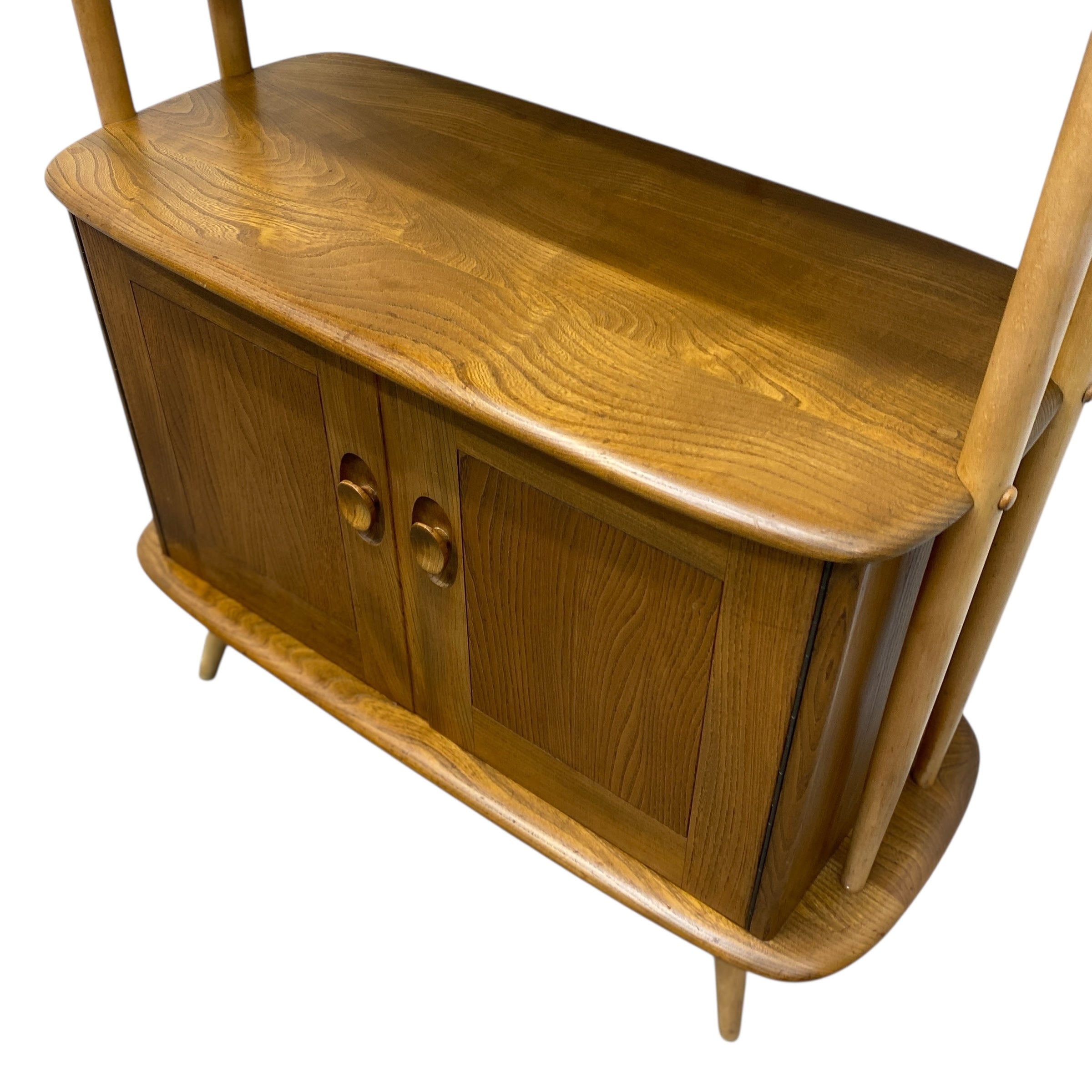Wooden sideboard with curved top and legs on a white background