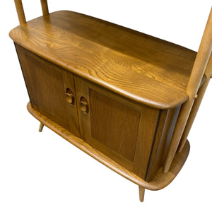 Wooden sideboard with curved top and legs on a white background