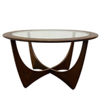 Load image into Gallery viewer, Modern coffee table with glass top and wooden base on a white background

