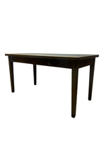 Load image into Gallery viewer, A dark brown wooden writing desk with a single drawer and small brass pull handles, shown from a three-quarter angle against a plain white background.
