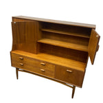 Load image into Gallery viewer, Mid-century modern wooden credenza or sideboard with three drawers, two cabinet doors, open shelving, and angled legs, shown on a plain white background.
