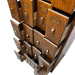 Load image into Gallery viewer, OPEN DRAWERS ON AN OAK CABINET

