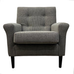 Load image into Gallery viewer, A gray textured armchair with button tufting on the backrest, rolled arms, and dark tapered legs, shown against a plain white background.
