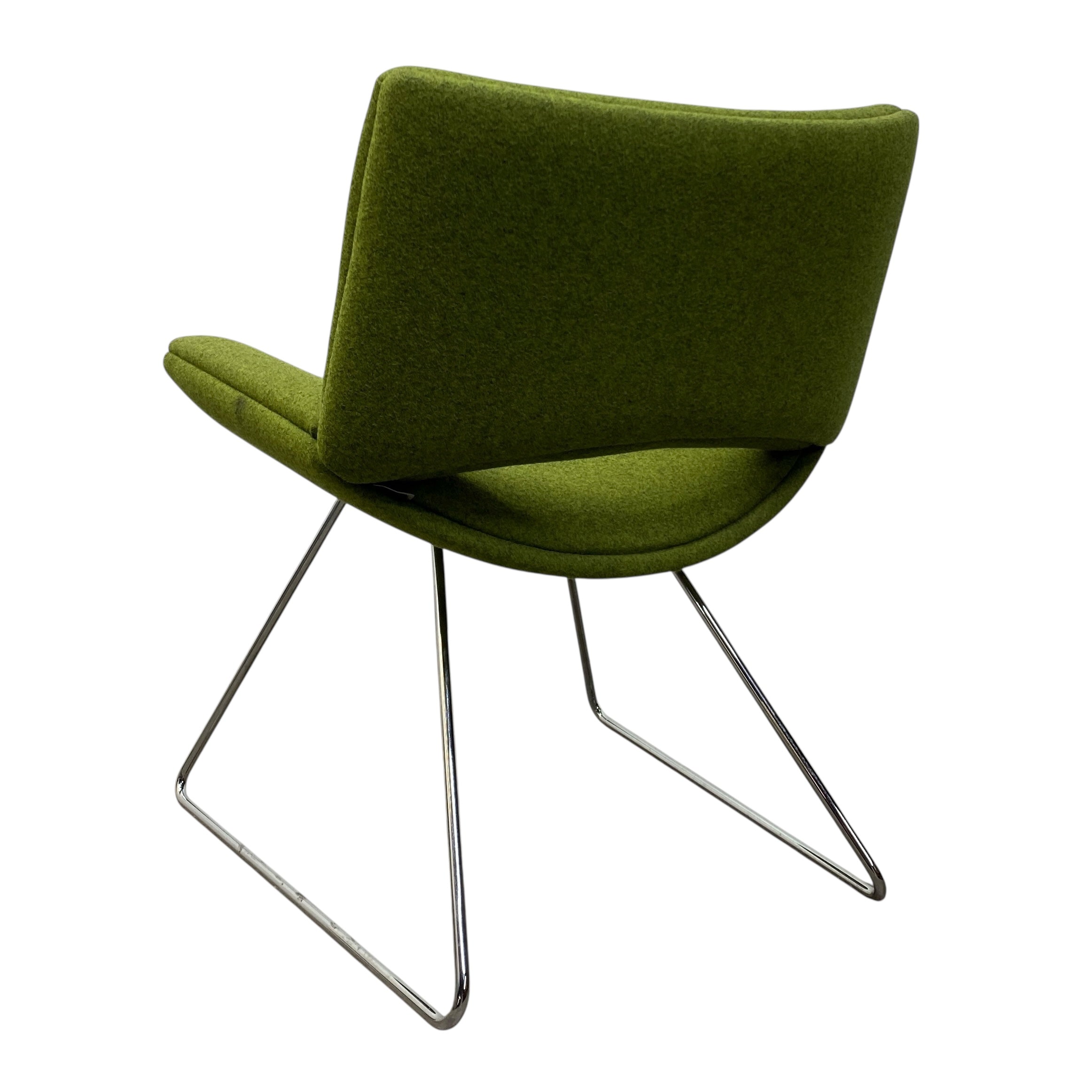 Green chair with metal legs on a white background