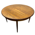 Load image into Gallery viewer, Round wooden table with a white background
