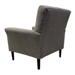 Load image into Gallery viewer, A gray textured fabric armchair with dark tapered legs, shown from a three-quarters angle against a plain white background.

