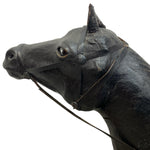 Load image into Gallery viewer, Black horse head sculpture with bridle on a white background
