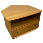 Load image into Gallery viewer, A mid-century modern wooden corner cabinet with a hexagonal top, featuring a single drawer with circular knobs and an open shelf behind it, shown on a white background.
