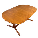 Load image into Gallery viewer, Wooden dining table with a white background
