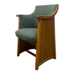 Load image into Gallery viewer, Chair with wooden frame and green cushion on a white background

