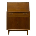 Load image into Gallery viewer, Mid-century modern wooden secretary desk with a warm brown wood grain finish, featuring a top cabinet, two drawers with oval pulls, two lower doors with round handles, and tapered legs.
