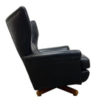 Load image into Gallery viewer, Black recliner chair on a white background
