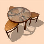 Load image into Gallery viewer, Wooden coffee table with glass top on a beige background
