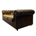 Load image into Gallery viewer, Brown leather sofa with tufted backrest on a white background
