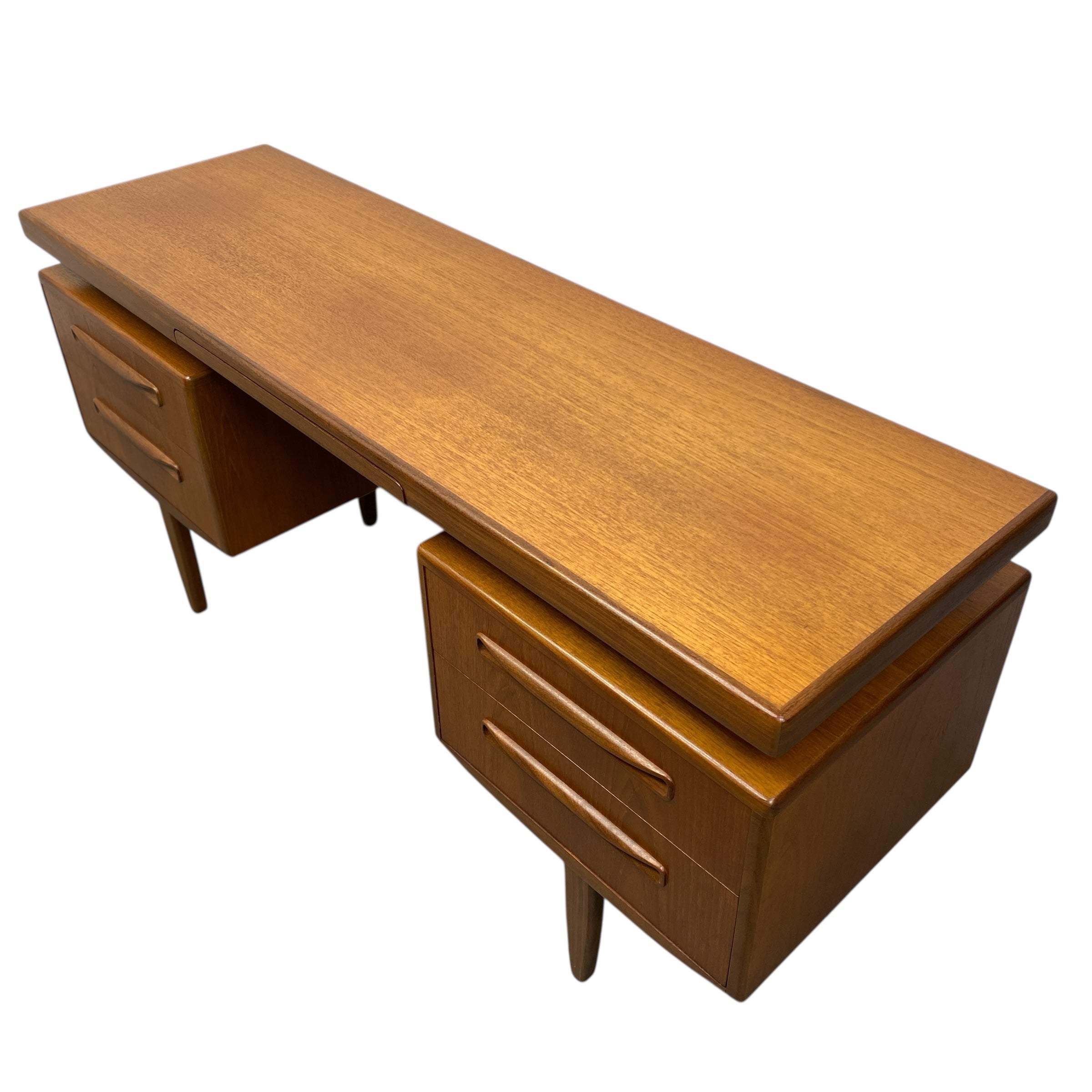 Wooden desk with multiple drawers on a white background