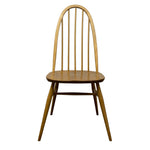 Load image into Gallery viewer, A mid-century modern wooden dining chair with a curved spindle back, a round seat, and tapered legs, shown against a plain white background.
