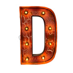 Load image into Gallery viewer, A decorative marquee-style letter D sign with a warm orange and red cracked metallic finish, surrounded by small illuminated bulbs, shown on a plain white background.
