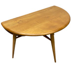 Load image into Gallery viewer, Wooden coffee table with a curved top on a white background
