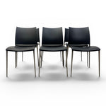 Load image into Gallery viewer, six black leather dining chairs on a white background
