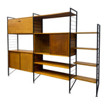 Load image into Gallery viewer, Wooden shelving unit with metal frame on a white background
