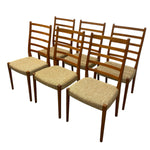 Load image into Gallery viewer, Set of six wooden chairs with woven seats on a white background
