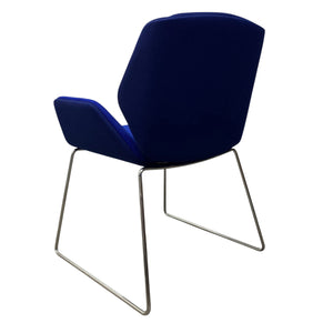 back of a blue chair on steel legs