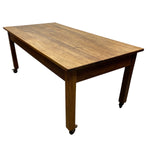 Load image into Gallery viewer, Wooden table with wheels on a white background
