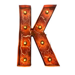 Load image into Gallery viewer, A decorative capital letter K light bulb sign with a glowing orange and red cracked-glass design and multiple warm yellow light bulbs, isolated on a white background.
