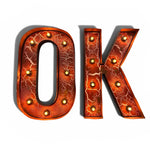Load image into Gallery viewer, Decorative metal letters 'O' and 'K' with a cracked copper or bronze finish and small gold light bulbs, shown on a white background.
