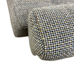 Load image into Gallery viewer, Close-up of a textured woven upholstery fabric in a gray, beige, and white pattern, showing the detailed weave of the material.
