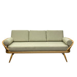 Load image into Gallery viewer, Light gray sofa with wooden frame on a white background
