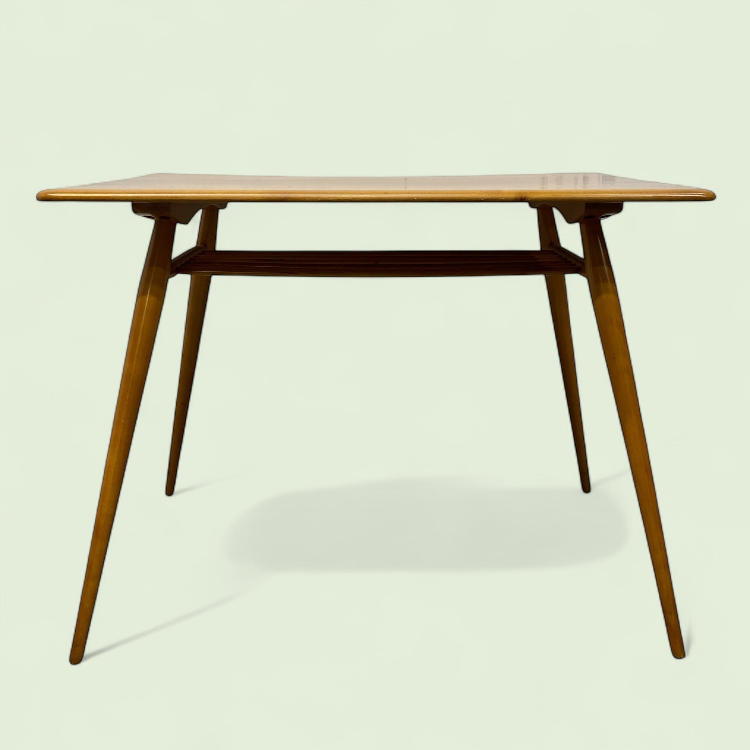 Wooden table with a minimalist design on a light background