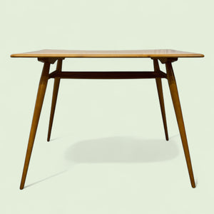 Wooden table with a minimalist design on a light background