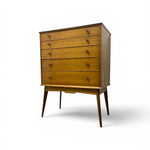 Load image into Gallery viewer, Wooden dresser with multiple drawers on a white background
