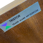 Load image into Gallery viewer, Tristor label with trade mark number on a wooden surface
