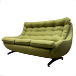 Load image into Gallery viewer, A mid-century modern tufted loveseat sofa in olive green fabric with black metal star legs, shown against a plain white background.
